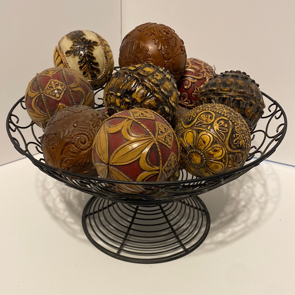 13 decor balls with black wire basket in excellent condition.